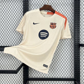 CAMISA DO BARCELONA 24/25 BEGE TREINO